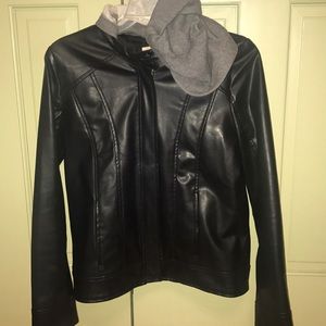 Leather jacket with grey sweatshirt hood